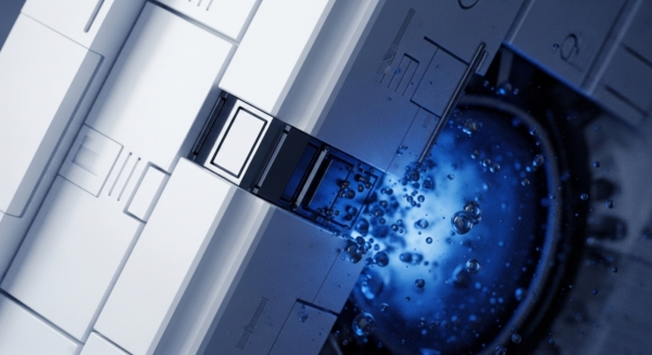 A stark contrast unfolds between rigid, structured, light-toned geometric forms on the left and a dynamic, dark blue liquid environment with numerous effervescent bubbles on the right. A dark, rectangular channel acts as a cross-chain bridge, connecting these distinct domains. This visual metaphor illustrates intricate blockchain architecture facilitating smart contract execution and liquidity pool interactions. The bubbly activity signifies real-time transaction throughput within a decentralized finance DeFi ecosystem, emphasizing data flow and tokenomics. The precise engineering suggests a robust consensus mechanism underpinning digital asset management.